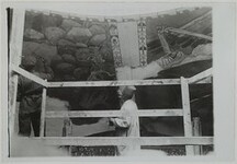 Akseli Gallen-Kallela painting the Kalevala cupola frescoes with an assistant in the National Museum of Finland, 1928.