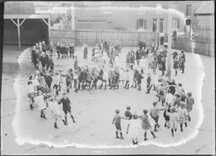 Children doing physical education exercises in school yard of Central School, Bathurst Street, Tasmania (c1900s)