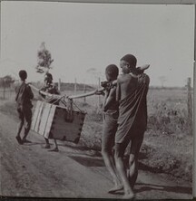 On the road to Nairobi. Brickhouse, Gallen-Kallela familyâ€™s home abroad, on the background. ; Photograph 3.