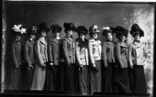Group portrait of women in hats and overcoats 1900