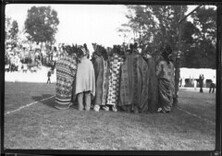 Group in Native American blankets and headdress' at Miami-Ohio Wesleyan football game 1926