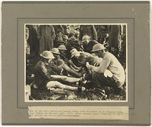 Men of the 40th Battalion [AIF] having their feet attended to at Dragoon Farm, near Ypres