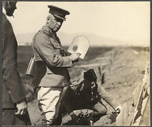 "Colonel Hughes and Lieutenant Colonel Loomis examining bullet marks on MacAdam Shield", Montreal Daily Star, p.5, 19 September 1914