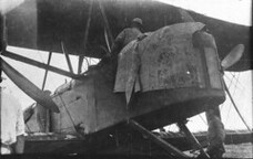 Crew checking fuselage; First England-Australia flight, Keith and Ross Smith, 1919 - Darwin, Northern Territory, Australia / photographer unknown