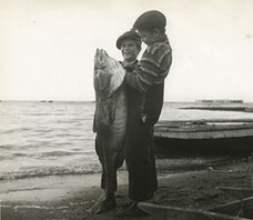 Hooking a big cod fish near Gascons, Quebec