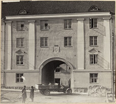 Architecture history collection: bricklayer's truck outside a stone building in Helsinki