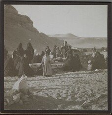 Arab women weep by the graves near the pyramids in late 1910. ; Photograph 1.