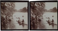 People by the river Tana with a hippo shot by Jorma Gallen-Kallela (sitting on a rock), 1910.