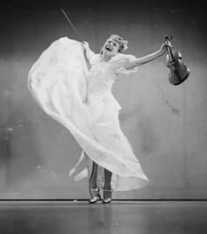 Studio photo of dancer with violin, 31 March 1939