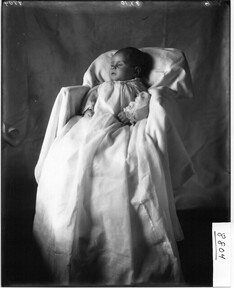 Portrait photograph of deceased infant, C. W. Stout 1908