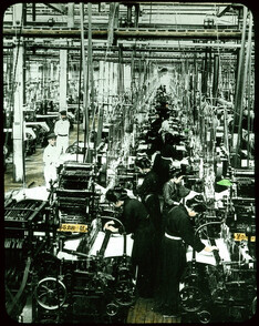 Machine-weaving in factory.