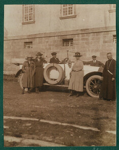Posing with the automobile, ca. 1920s