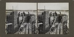Stereoscopic photograph picturing the construction of the roof at TarvaspÃ¤Ã¤