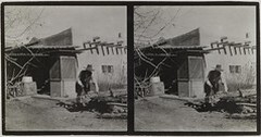 Akseli Gallen-Kallela sawing a trunk at the Gallen-KallelasÂ´ house in Taos, New Mexico, ca.1925.