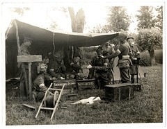 Brigade Signal Section [Dehra Dun Brigade]. Headquarter Section at work in the field [St Floris, France]. Photographer: H. D. Girdwood.