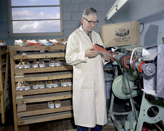 Inspecting shoes at Jaguar Shoes, Calgary, Alberta