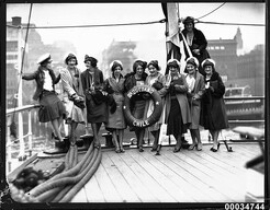 Ten women on deck of the Chilean naval vessel GENERAL BAQUEDANO in Circular Quay, July 1931
