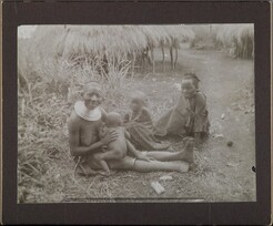 Local people came to meet the Gallen-Kallela family in hopes of medicine. Mary and Kirsti Gallen-Kallela tried to help them with medicines they had in the familyâ€™s pharmacy kit. ; Photograph with a frame.