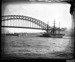 Chilean naval vessel GENERAL BAQUEDANO and tug in Sydney Harbour, July 1931