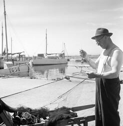 Fisherman at Smyge fishing village, Smygehuk, Smygehamn, SkÃ¥ne, Sweden