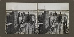 Stereoscopic photograph picturing the construction of the roof at TarvaspÃ¤Ã¤