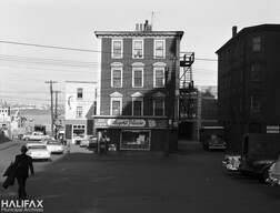 East-facing view of Lower Water St. at the corner of George St., showing the Dartmouth Ferry dock in the background