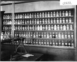 Chemicals on shelf in chemistry laboratory at Miami University 1911