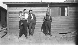Group portrait with broom