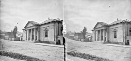 "One-storey building, possibly a railway station, with steps, and 4 column, Ionic portico" is Armagh Courthouse
