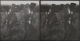 Akseli Gallen-Kallela's servants carry dead vultures near the Tana River in June 1910.
