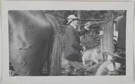 Akseli Gallen-Kallela about to have some coffee with hay makers at Alberga, near Helsinki, 1914.