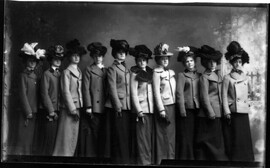 Group portrait of women in hats and overcoats 1900