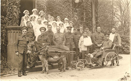 Nurses and soldiers with a donkey cart