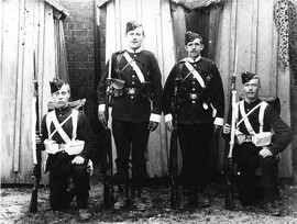 Four riflemen circa 1910 (archive ref DDX1319-2-10)