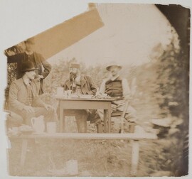 Axel GallÃ©n (on the left) sitting  with G. A. Serlachius and Louis Sparre in a garden in Keuruu, 1889.
