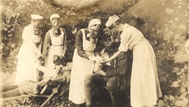 Nurses in gas masks at the trenches, Germany