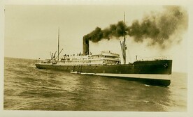 Sinking liner SS TAHITI with life boats being lowered
