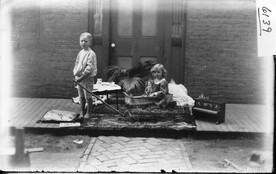 Small boy with girl in wagon 1904