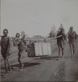 On the road to Nairobi. Brickhouse, Gallen-Kallela familyâ€™s home abroad, on the background. ; Photograph 2.