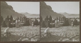 Arab women weep by the graves near the pyramids in late 1910.