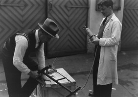 A man is recording sound effects, 1930s