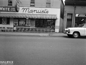 Manuel's Red & White Food Store, [60] Windsor St., showing Windsor Fish & Chips in the background
