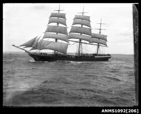 ARISTIDES  underway with crew members visible on fore deck and main yard