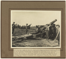 Nos 1, 2 and 3 guns of the First Australian Siege Battery in position, Ypres-Comines Road. Figures in foreground: Corporal J. Purdue, Gunner C. Jackson, Bombadier W. Fenton, Gunner P.N.F. Clarke
