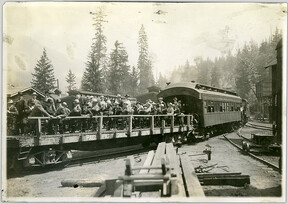View of journalists preparing for a train tour of logging areas