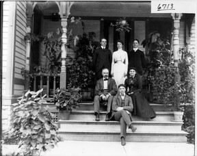 Flower family on porch ca. 1905
