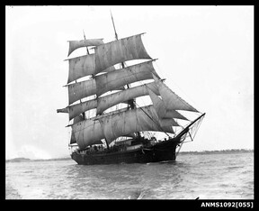 Three-masted barque underway with sails set, possibly Sydney Harbour