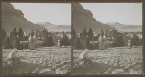 Arab women weep by the graves near the pyramids in late 1910.