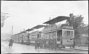 Double-decker trams - Hobart street in rain
