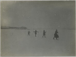 Four Hungarian children skiing on ice; photograph 1.
